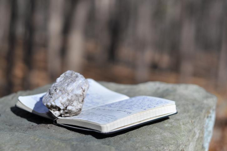A rock on a book on a rock