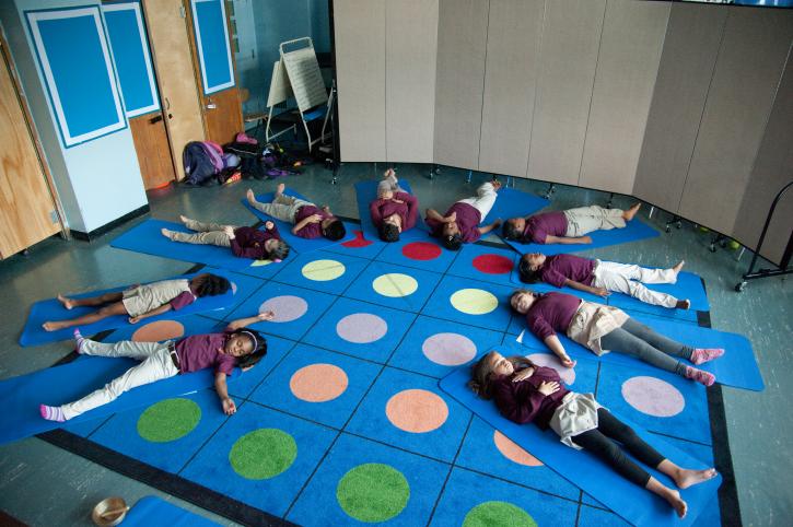 Kids doing a mindfulness exercise