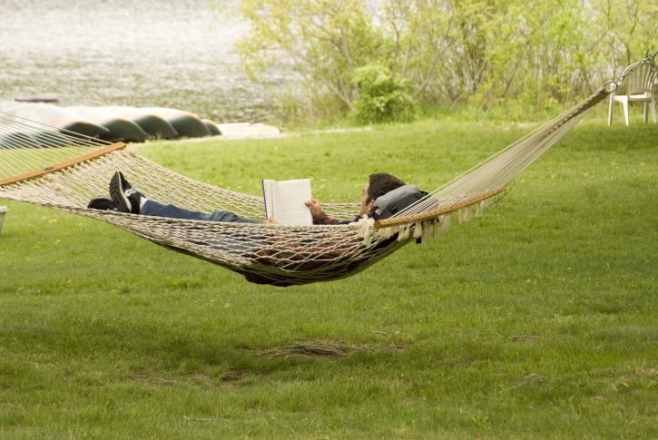 Lounging in a lakeside hammock