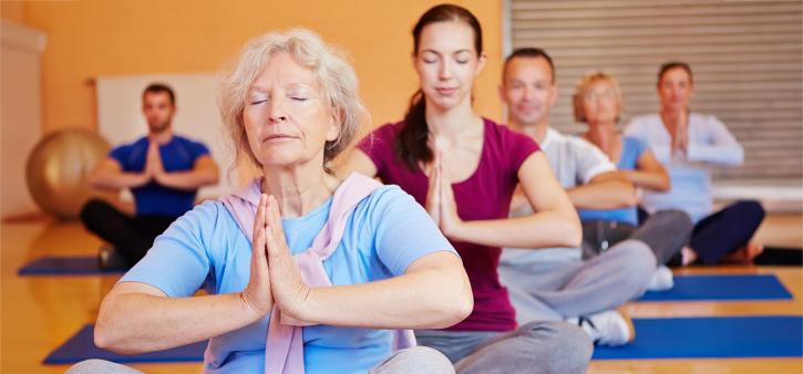 Group of people in a yoga class