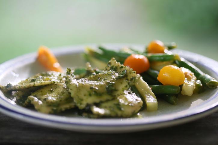 Pesto Ravioli with green beans and heirloom tomatoes